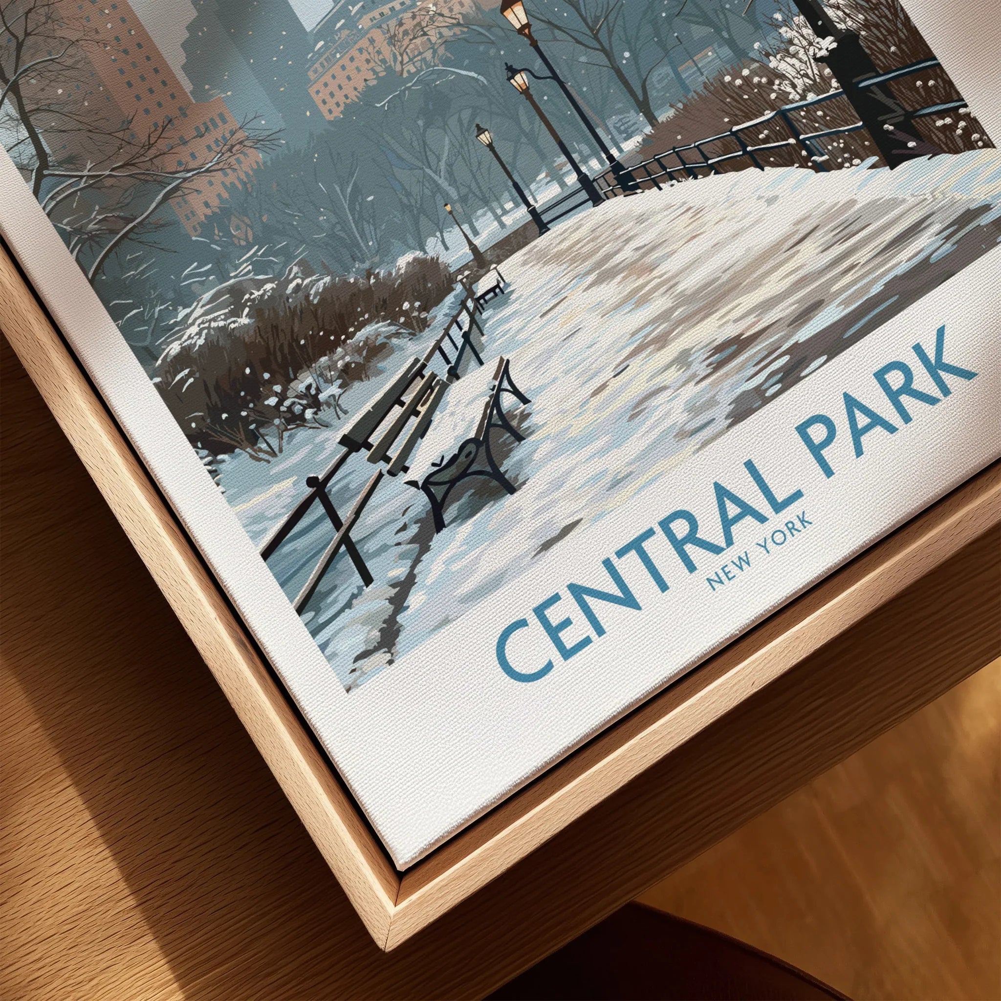 Framed Central Park winter art print with snowy path and benches, close-up view.