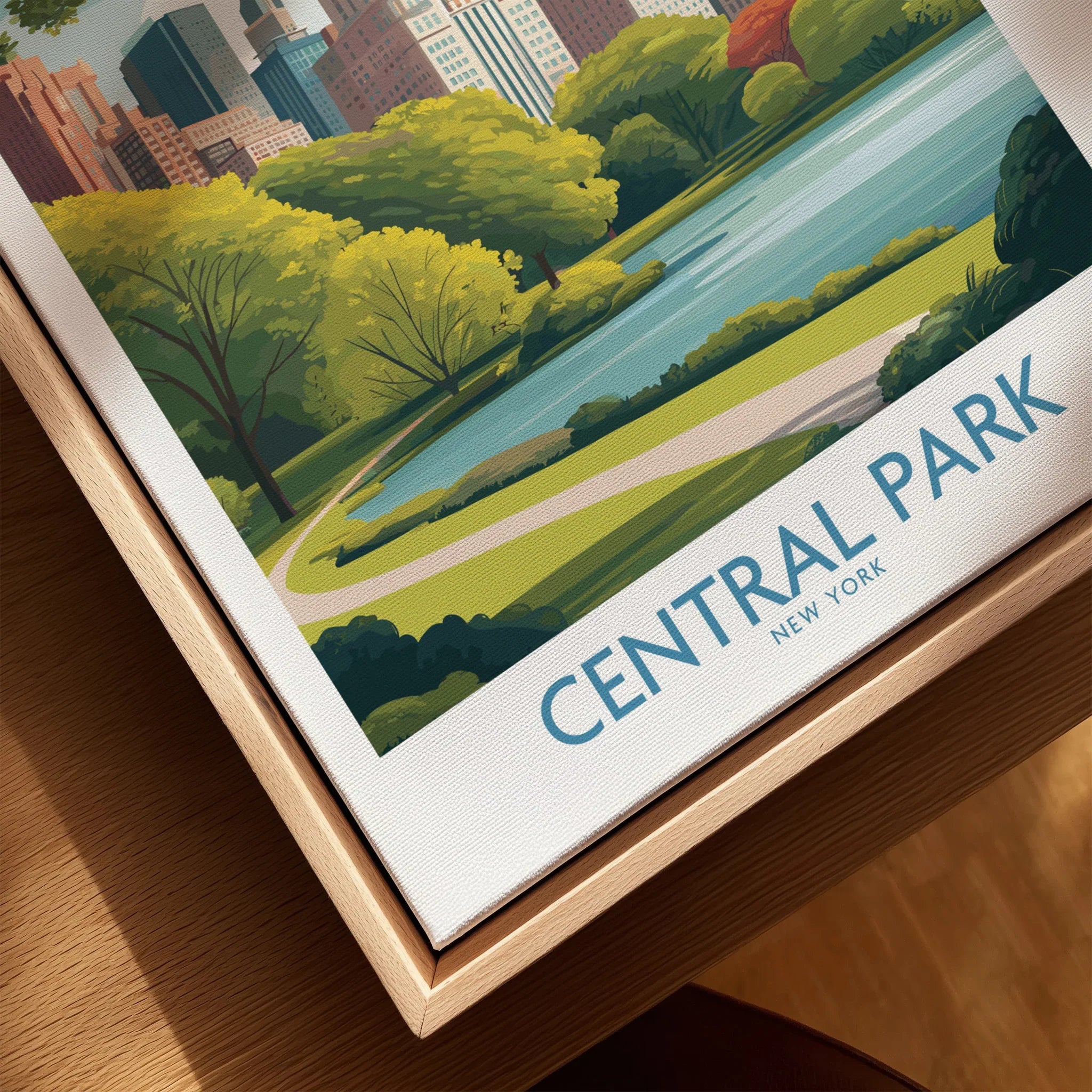 Close-up of framed Central Park New York art print with natural wood floating frame