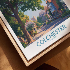 Closeup of Colchester England travel poster in natural wood floating frame, wall art decor