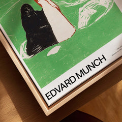 Edvard Munch Art Print - Two Women on the Shore 1898 Woodcut AIC Poster displayed on a wooden surface.