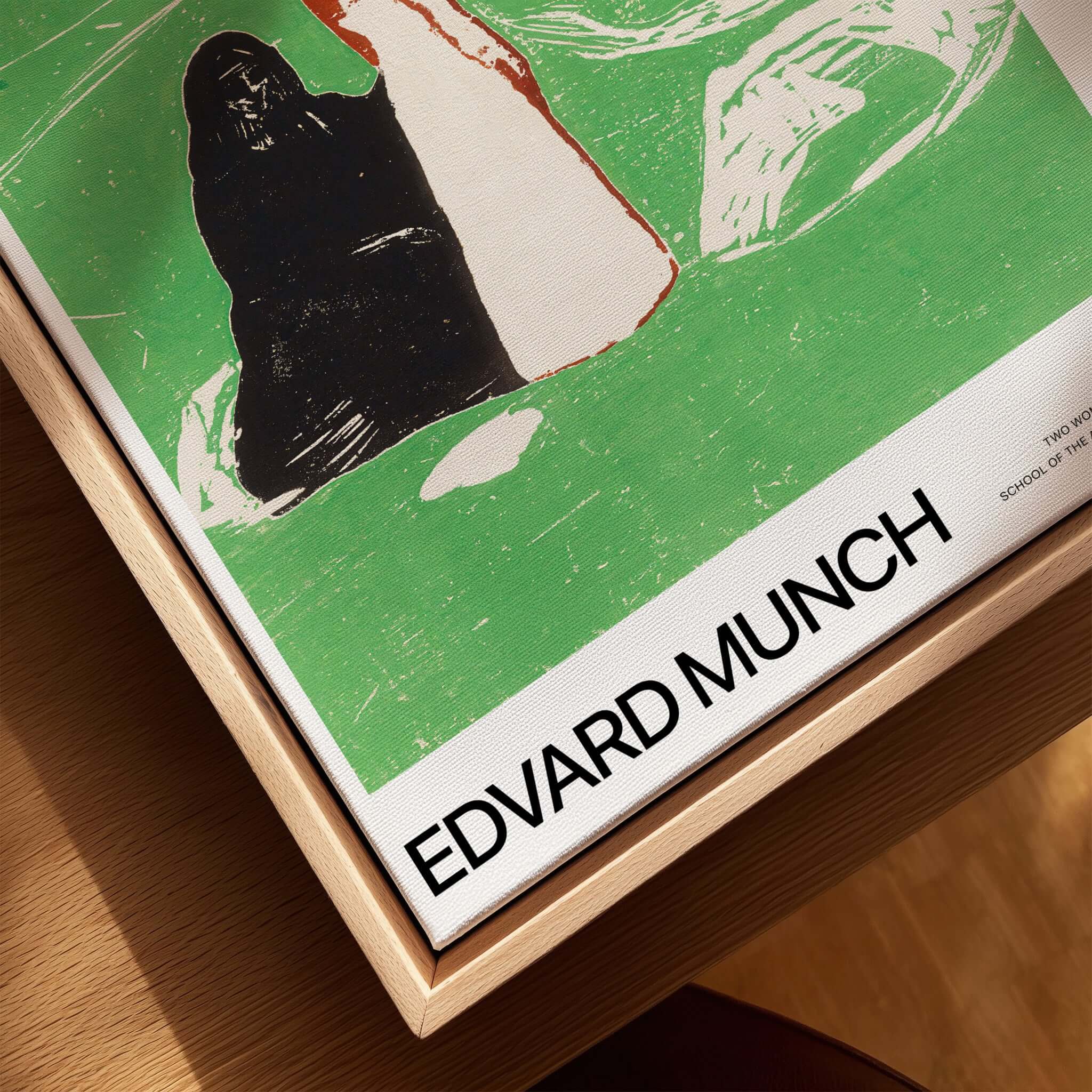 Edvard Munch Art Print - Two Women on the Shore 1898 Woodcut AIC Poster displayed on a wooden surface.