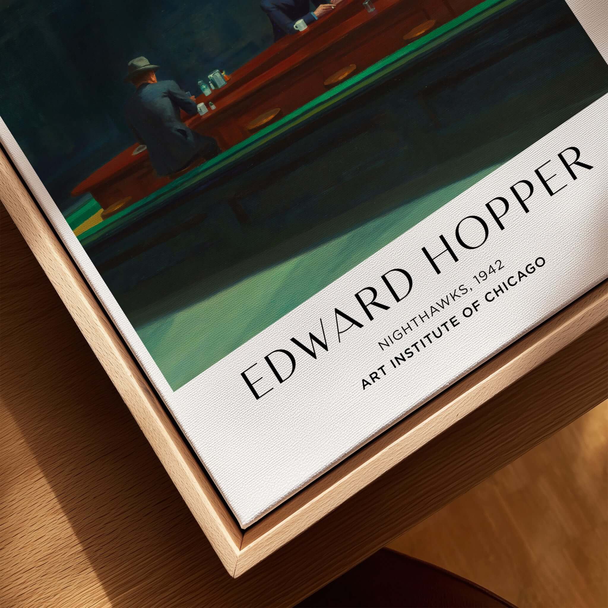 Edward Hopper Nighthawks 1942 Iconic Diner Art Print AIC Poster displayed in a wooden frame.