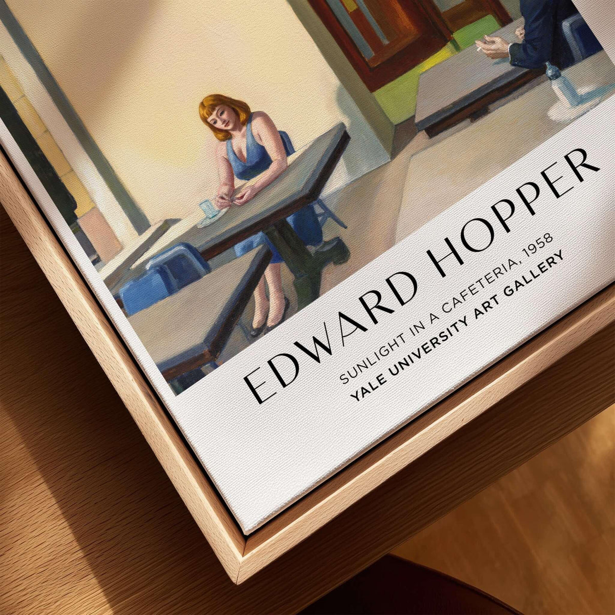 Edward Hopper Sunlight in a Cafeteria 1958 Yale Art Gallery Print displayed in a wooden frame on a table.