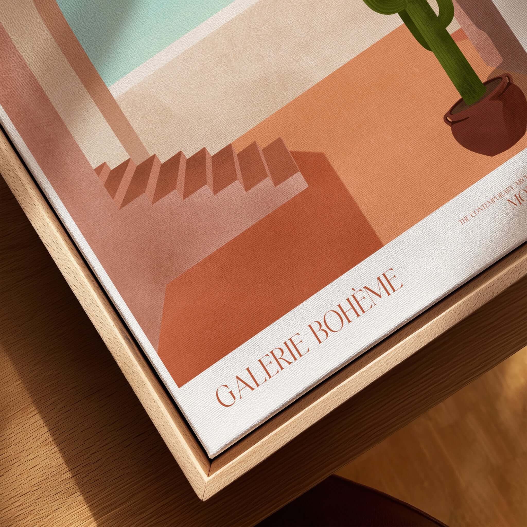 Galerie Bohème Moroccan Archway Cactus Art Print Terracotta Wall Decor Poster displayed on wooden surface