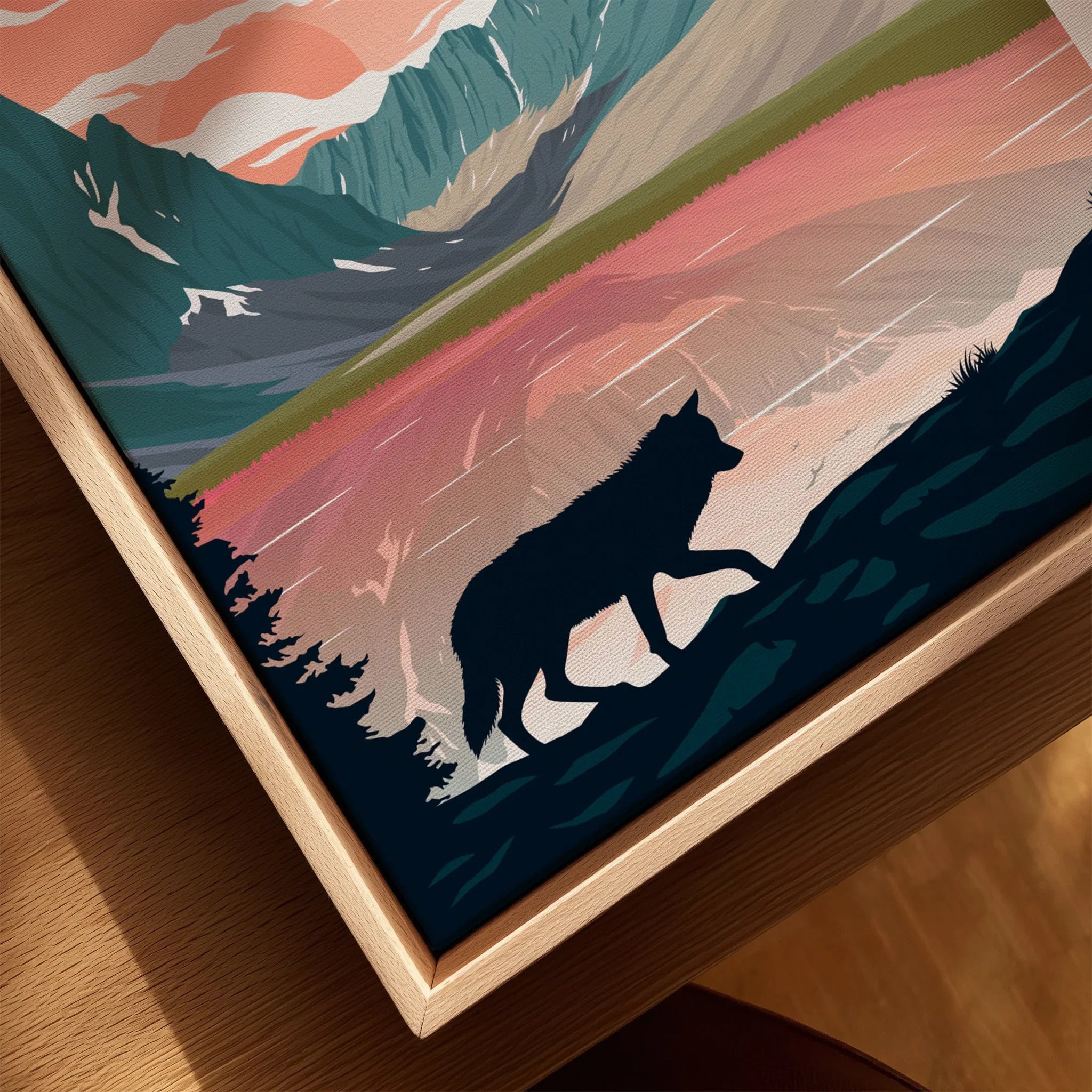 Closeup of framed canvas wall art with wolf silhouette, mountains, and scenic landscape