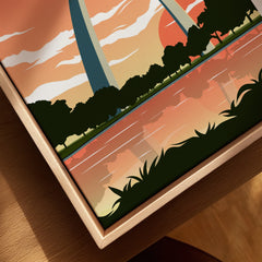 Close-up framed canvas art of Gateway Arch with sunset, trees, and water reflection