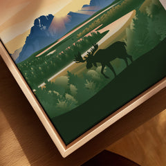 Framed canvas art with moose silhouette, pine trees, and Grand Teton mountains