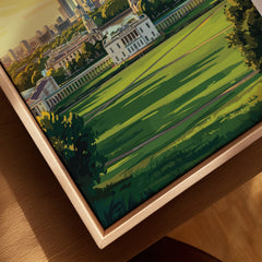 Closeup of framed canvas featuring scenic park landscape and classic buildings, natural wood frame