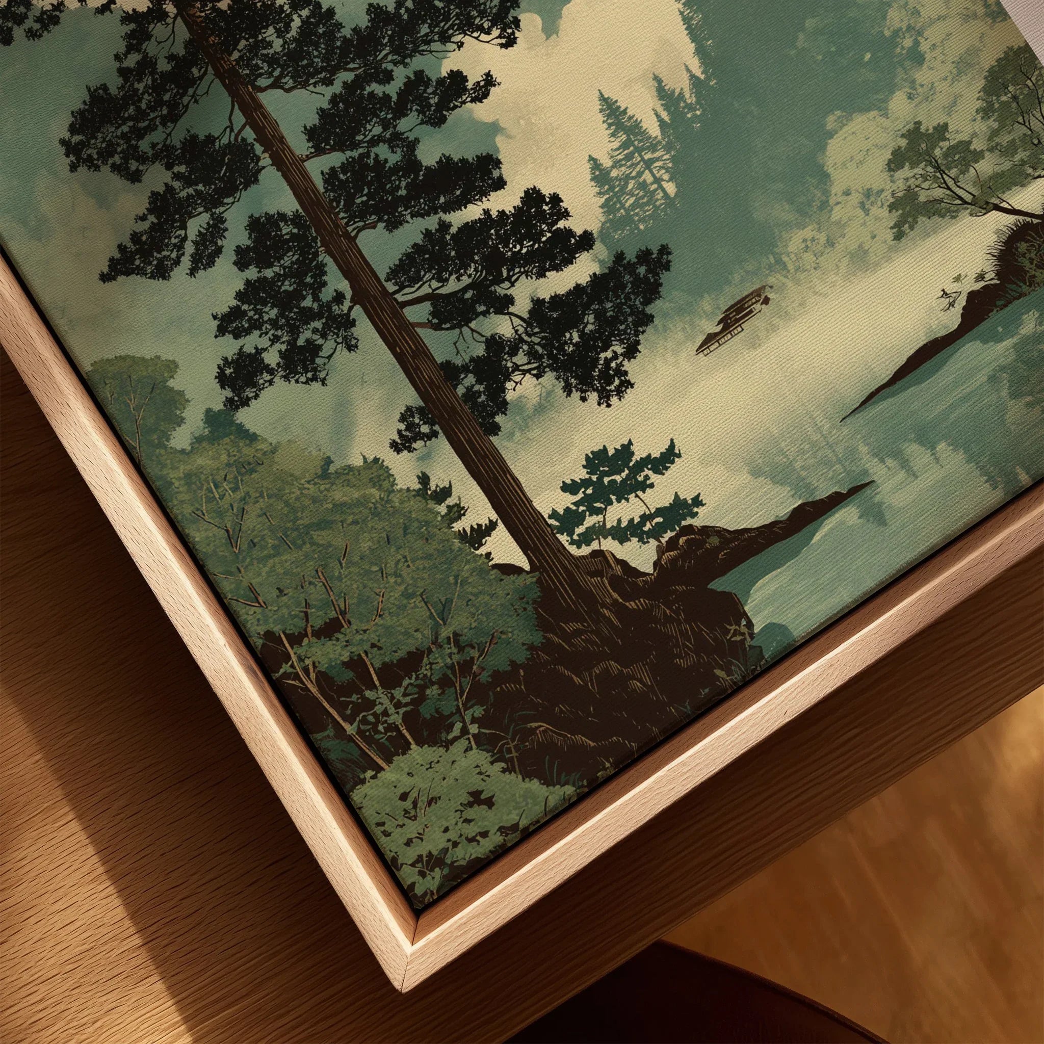 Closeup of framed canvas with Japanese woodblock print style landscape, pine trees, lake