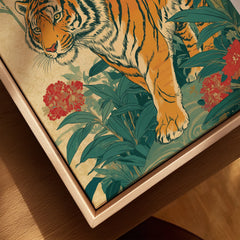 Close-up of framed canvas art featuring an illustrated tiger with flowers and green foliage