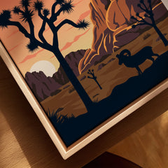 Closeup of framed Joshua Tree National Park print with ram and desert sunset scene