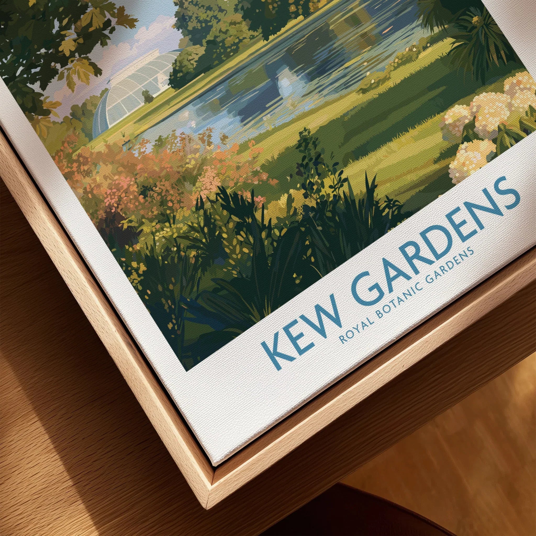 Close-up of Kew Gardens travel poster on canvas in a natural wood floating frame