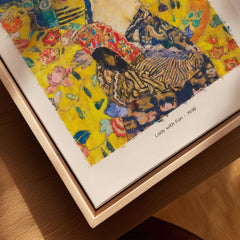 Gustav Klimt Lady with Fan Art Print 1918 - Art Nouveau Poster displayed in a wooden frame with vibrant colors.
