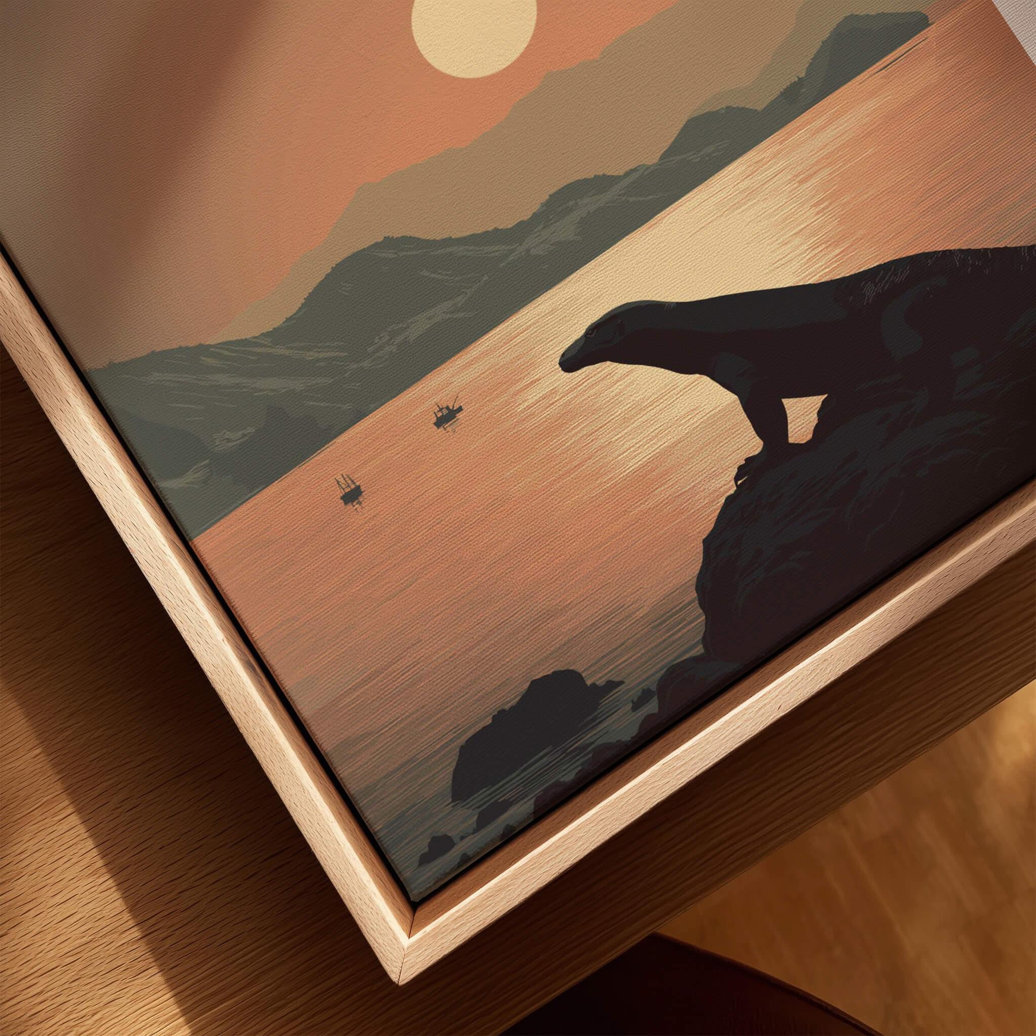 Close-up of framed travel poster with Komodo dragon silhouette at sunset by the water