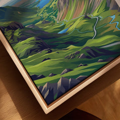 Close-up of a framed canvas print featuring a colorful mountain landscape wall art