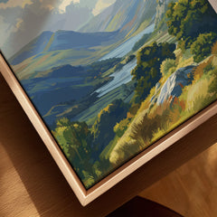 Close-up of framed canvas wall art showing a colorful mountain landscape in a natural wood floating frame.