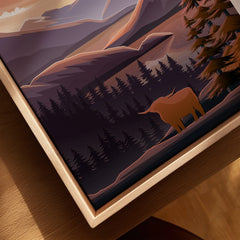 Closeup of framed canvas wall art featuring a highland cow, pine trees, and mountain landscape.