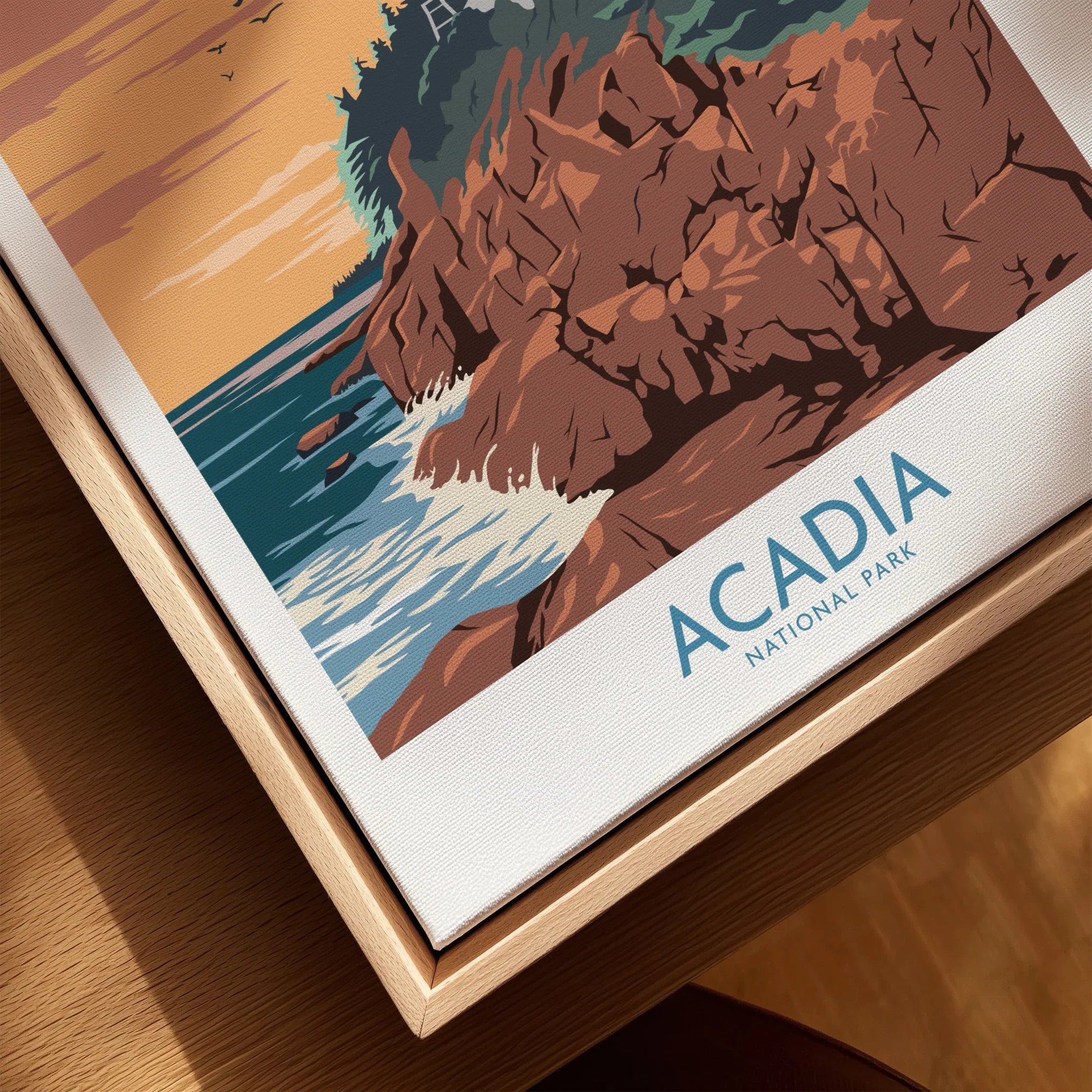 Closeup of Acadia National Park art print with rocky coast in natural wood floating frame