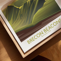 Close-up of framed canvas Brecon Beacons National Park wall art with natural wood frame