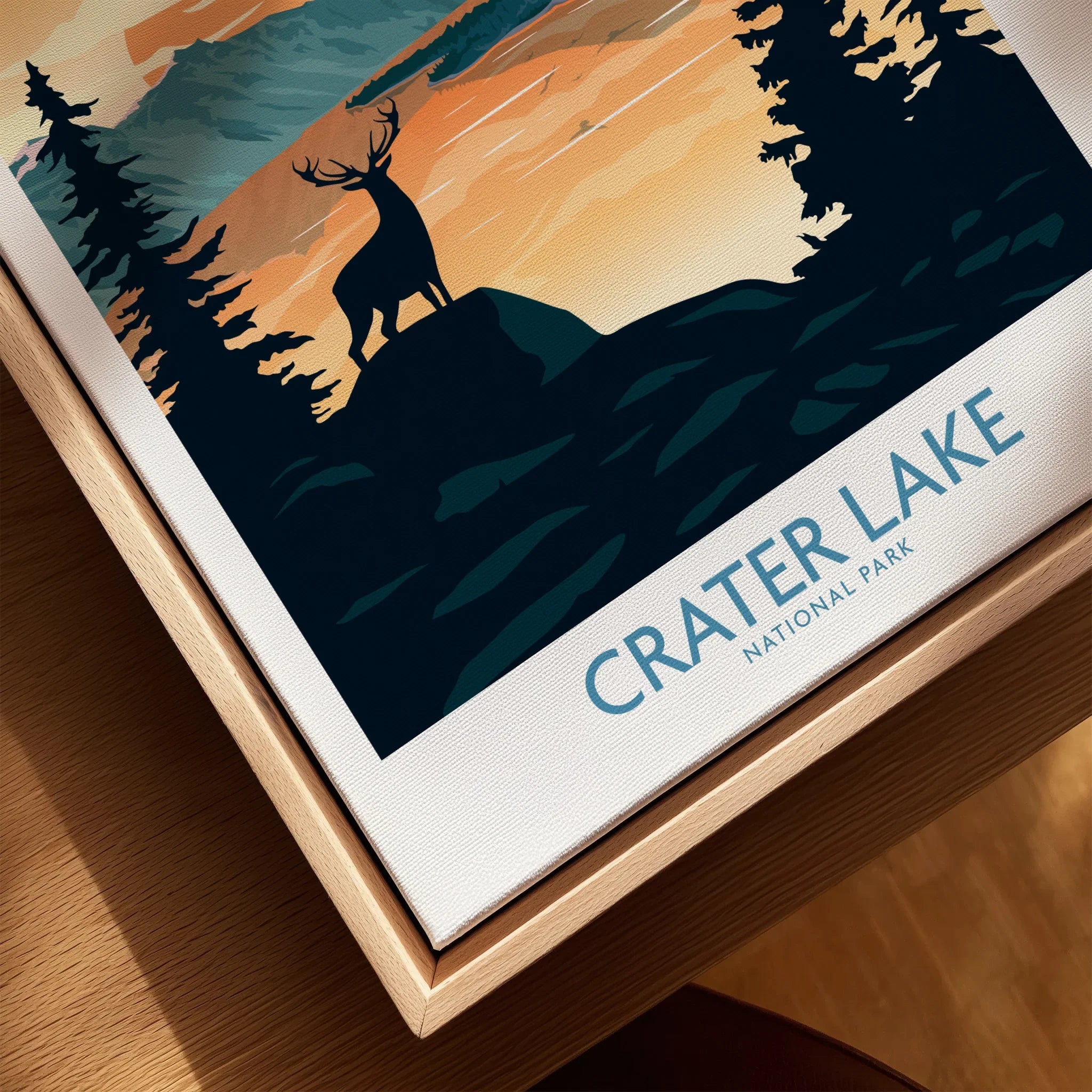 Framed Crater Lake National Park canvas print with sunset and deer illustration.