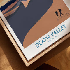 Framed Death Valley National Park wall art canvas with hikers and desert landscape