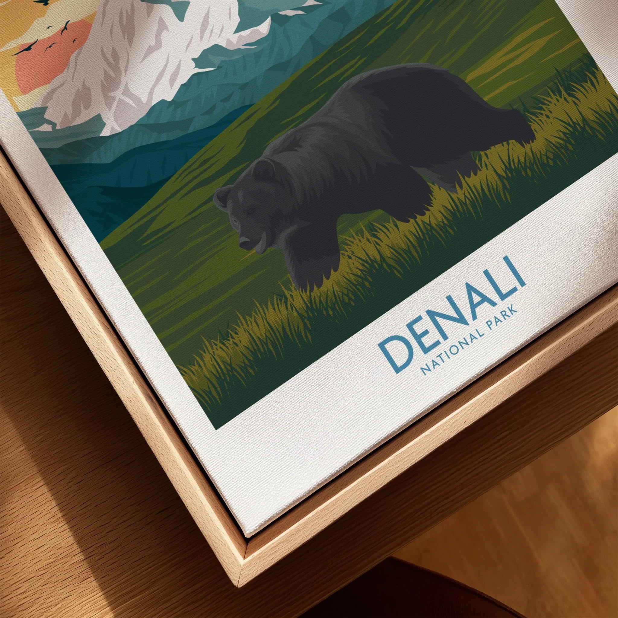Denali National Park art print in natural wood floating frame, featuring a bear and mountains.