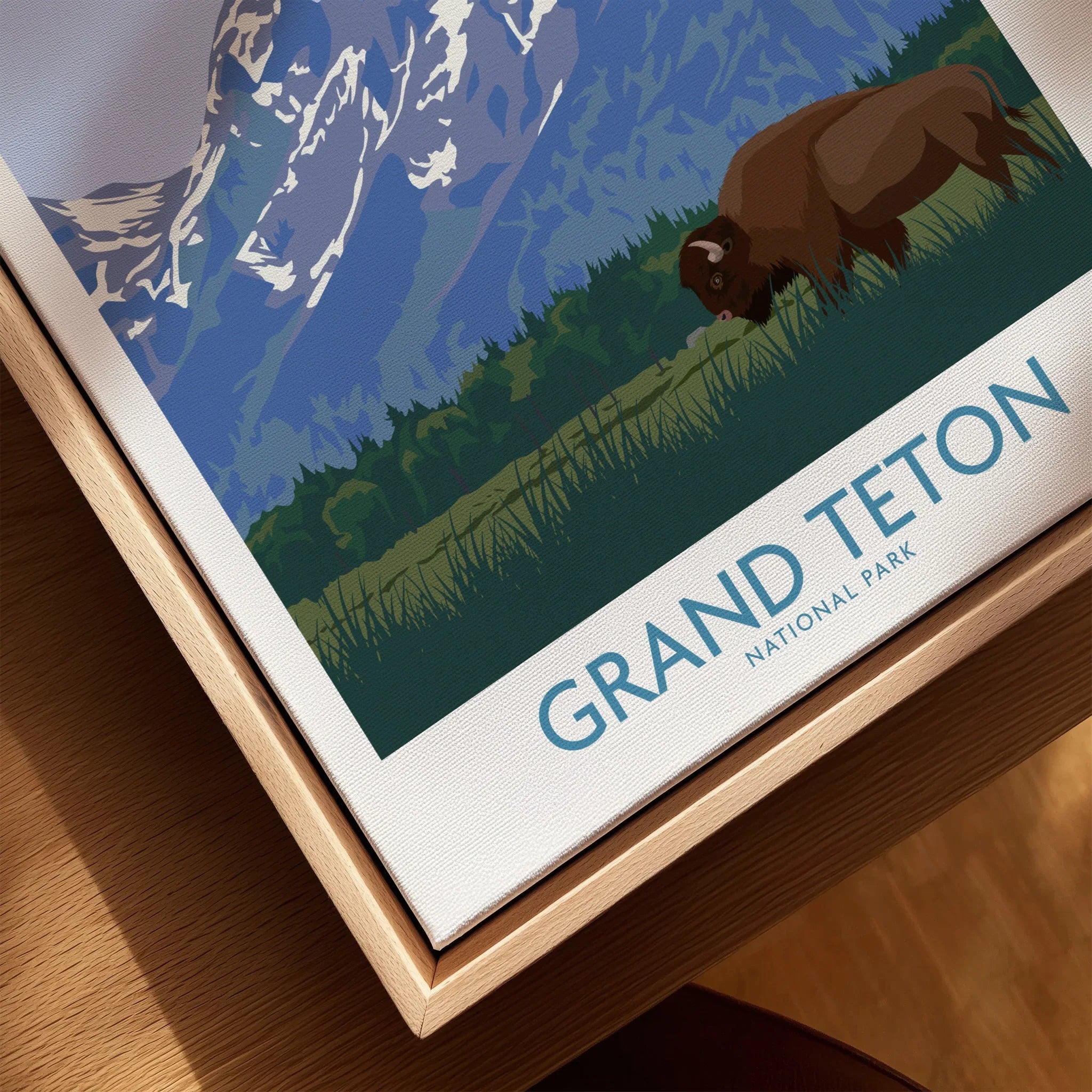Closeup of Grand Teton National Park print with bison in natural wood floating frame
