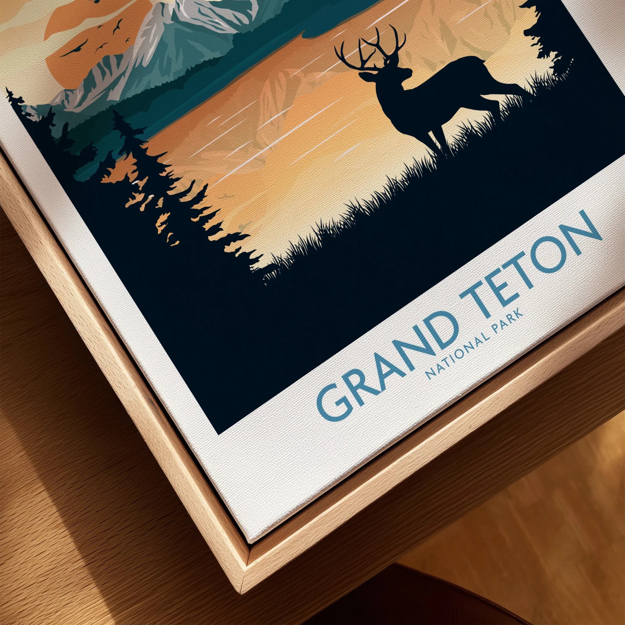 Grand Teton National Park framed wall art with deer silhouette, mountains, and sunset.