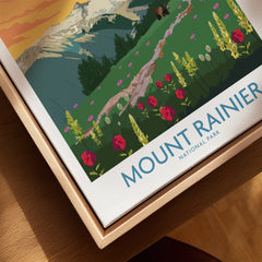 Closeup of Mount Rainier National Park travel poster with wildflowers in a natural wood frame