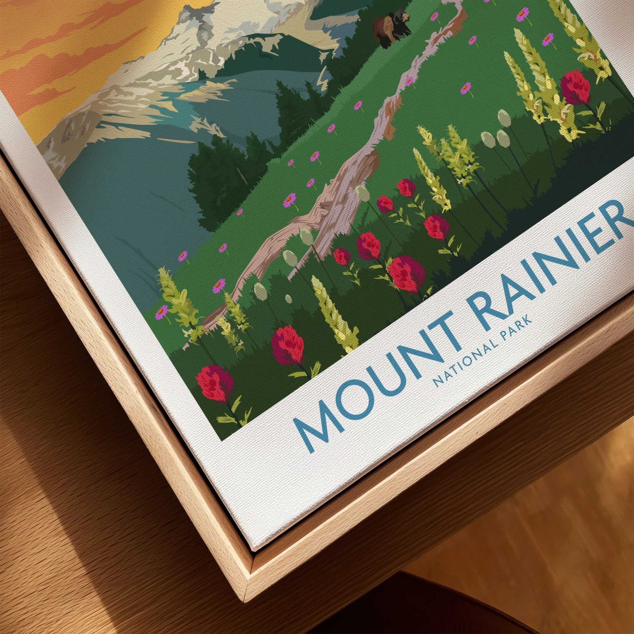 Closeup of Mount Rainier National Park travel poster with wildflowers in a natural wood frame