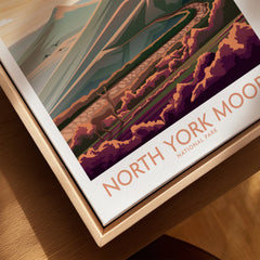 Closeup of North York Moors National Park art print in natural wood floating frame