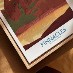 Closeup of Pinnacles National Park travel poster in natural wood floating frame