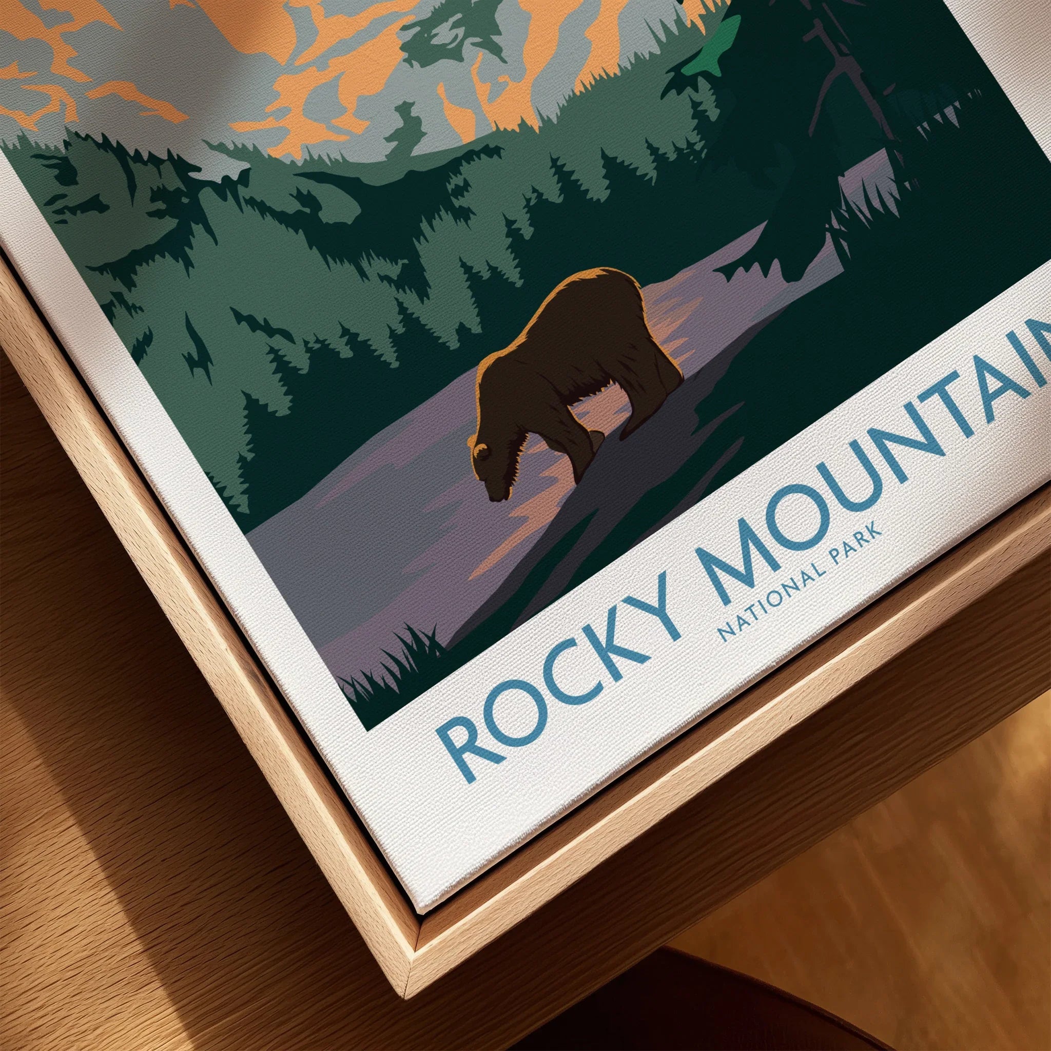 Rocky Mountain National Park wall art with bear illustration in natural wood floating frame