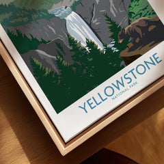 Framed canvas print of Yellowstone National Park with bear, waterfall, and pine trees.