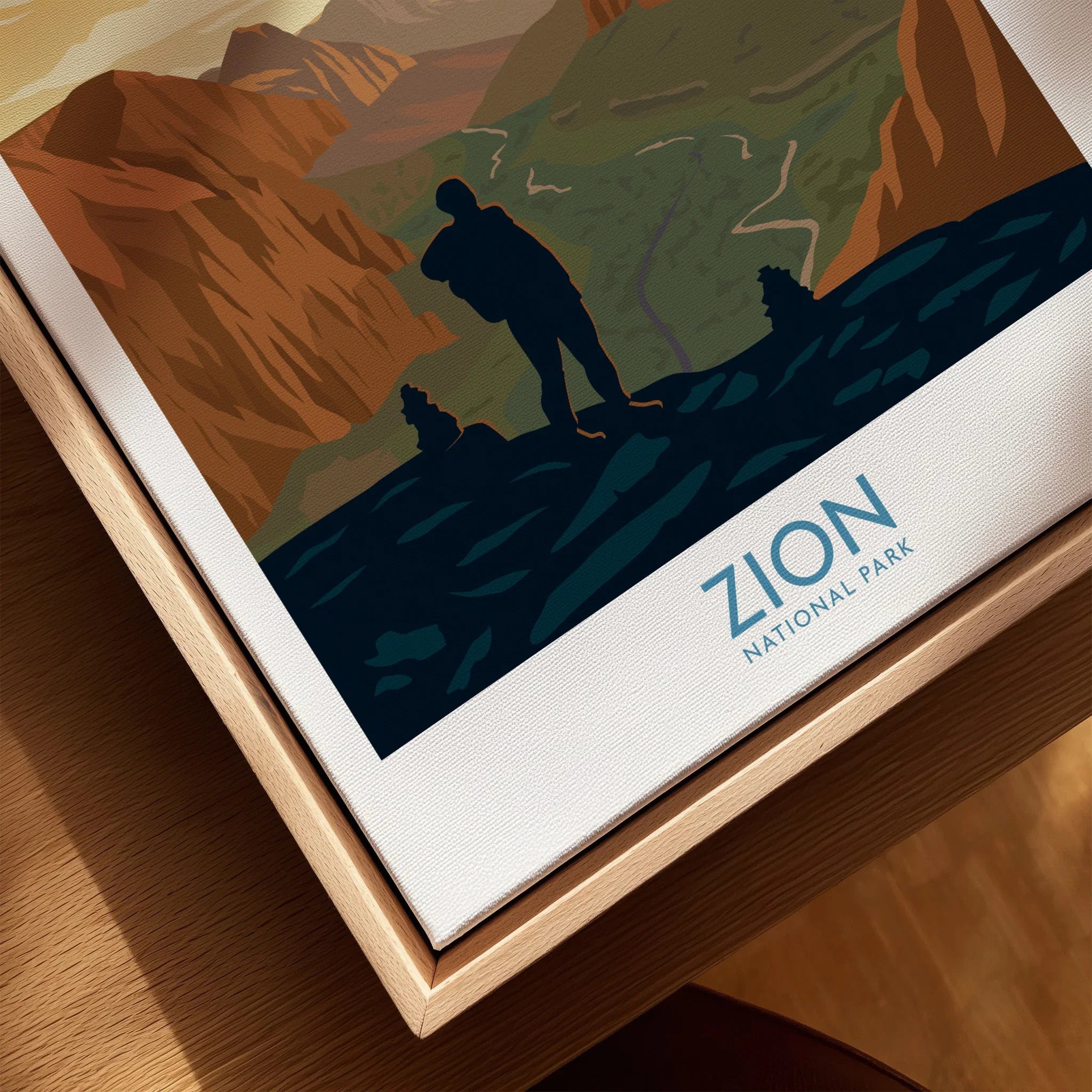 Framed Zion National Park travel poster with hiker and canyon landscape, natural wood frame