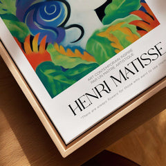 Matisse Art Prints - Woman with Flowers Abstract Art Print displayed on a wooden frame with colorful foliage and quote.