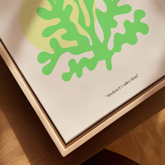 Matisse Art Prints - Lime Green Coral Abstract Sun Print close-up view of vibrant coral design on canvas in a wooden frame.