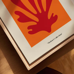 Matisse Art Prints - Red Leaf Abstract Orange Square Poster displayed in a wooden frame highlighting bold colors.