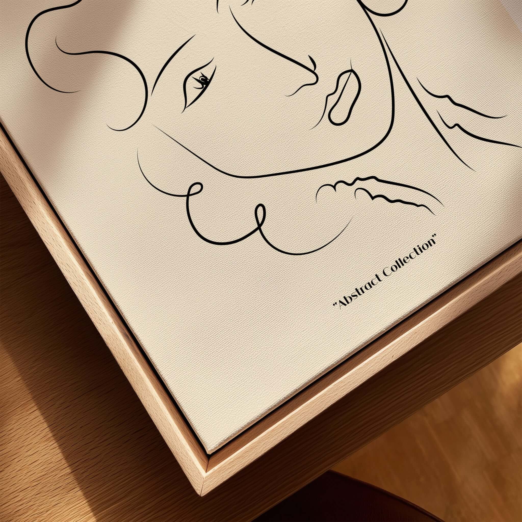 Matisse Art Prints -  Line Art Ladies Face with Wavy Hair Minimalist Poster displayed on a wooden surface with abstract design.