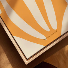 Matisse Art Prints - Orange Fan Coral Abstract Shape Poster displayed on a wooden surface, highlighting the vibrant design.