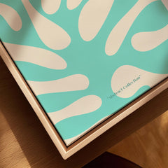 Matisse Art Prints - Mint Green Coral Abstract Seaweed Poster displayed in a wooden box showcasing the Abstract Collection.