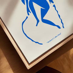 Matisse Art Prints -  Blue Nude Seated Figure Poster close-up showing bold blue silhouette on beige background.