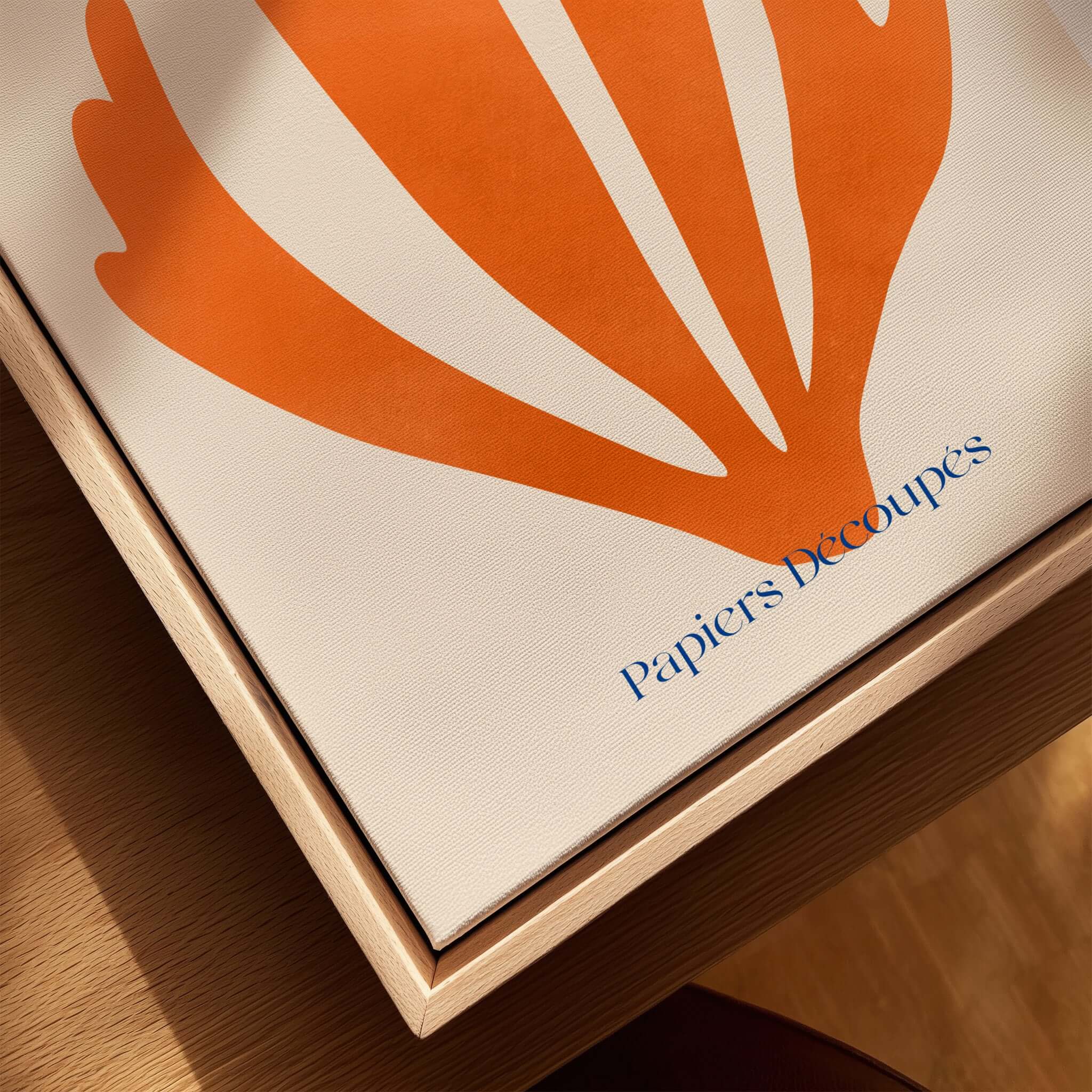 Matisse Papiers Découpés Orange Abstract Botanical Cut Out Art Print displayed on a wooden surface.