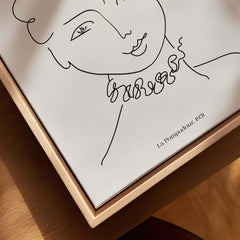 Matisse Art Print La Pompadour 1951 Minimalist Line Drawing Poster on display with elegant design.