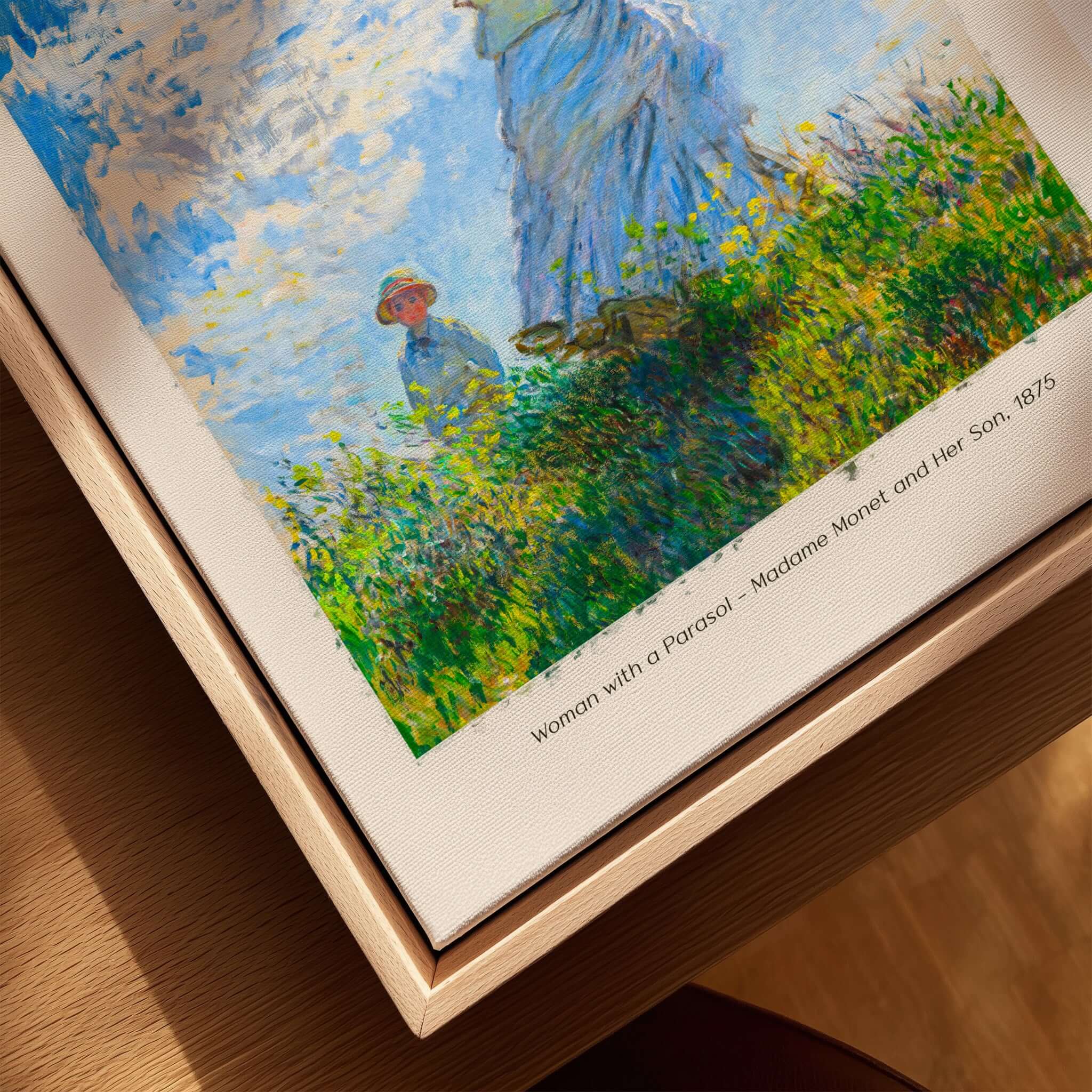 Monet Woman with Parasol Madame Monet Son Impressionist Art Print Poster displayed in a wooden frame.
