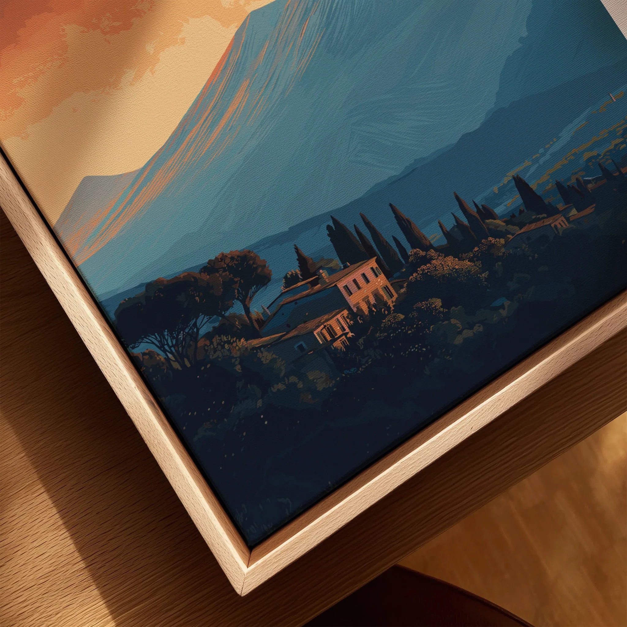 Close-up of framed canvas wall art featuring Mount Etna and Italian countryside homes.