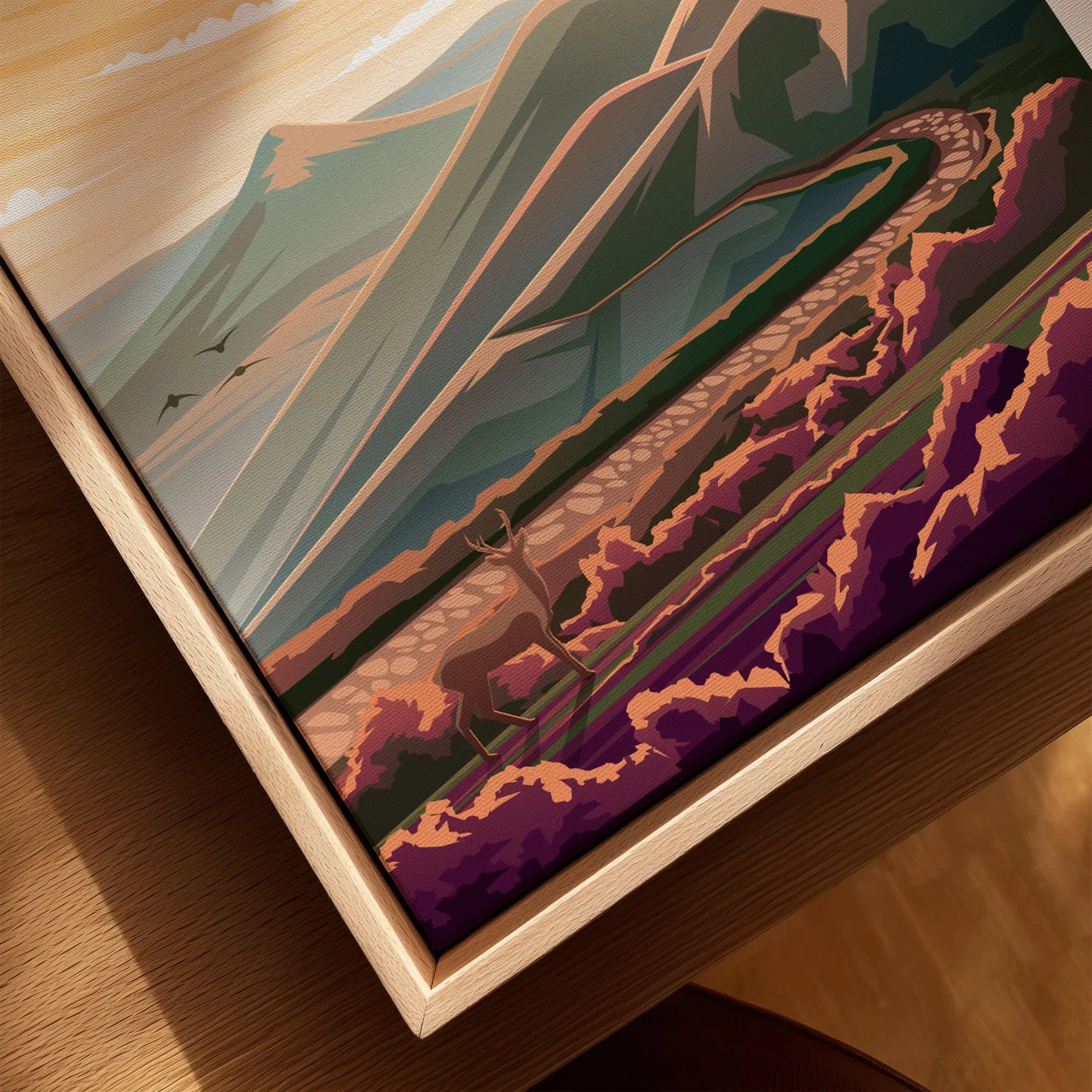 Close-up of framed canvas wall art featuring North York Moors landscape and a deer.