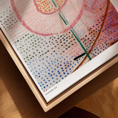 Paul Klee Blossoming Abstract Floral Modern Poster Art Print Decor displayed in a wooden frame, featuring intricate patterns and colors.