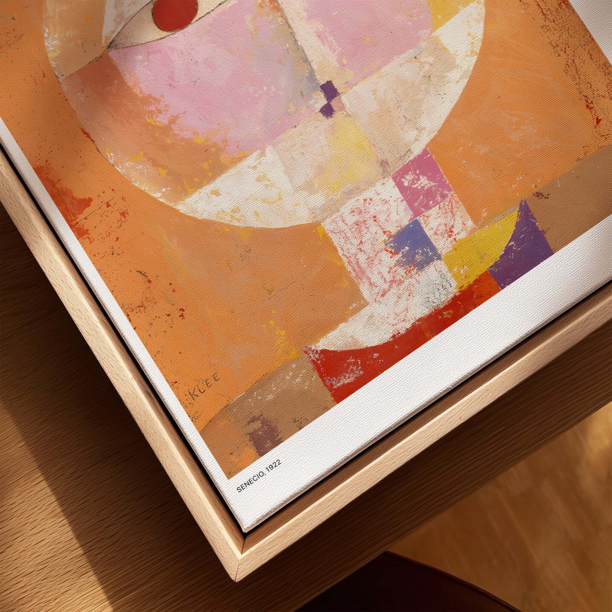 Paul Klee Senecio Head of Man Abstract Portrait Poster Art Print displayed in a wooden frame showing vibrant geometric colors.