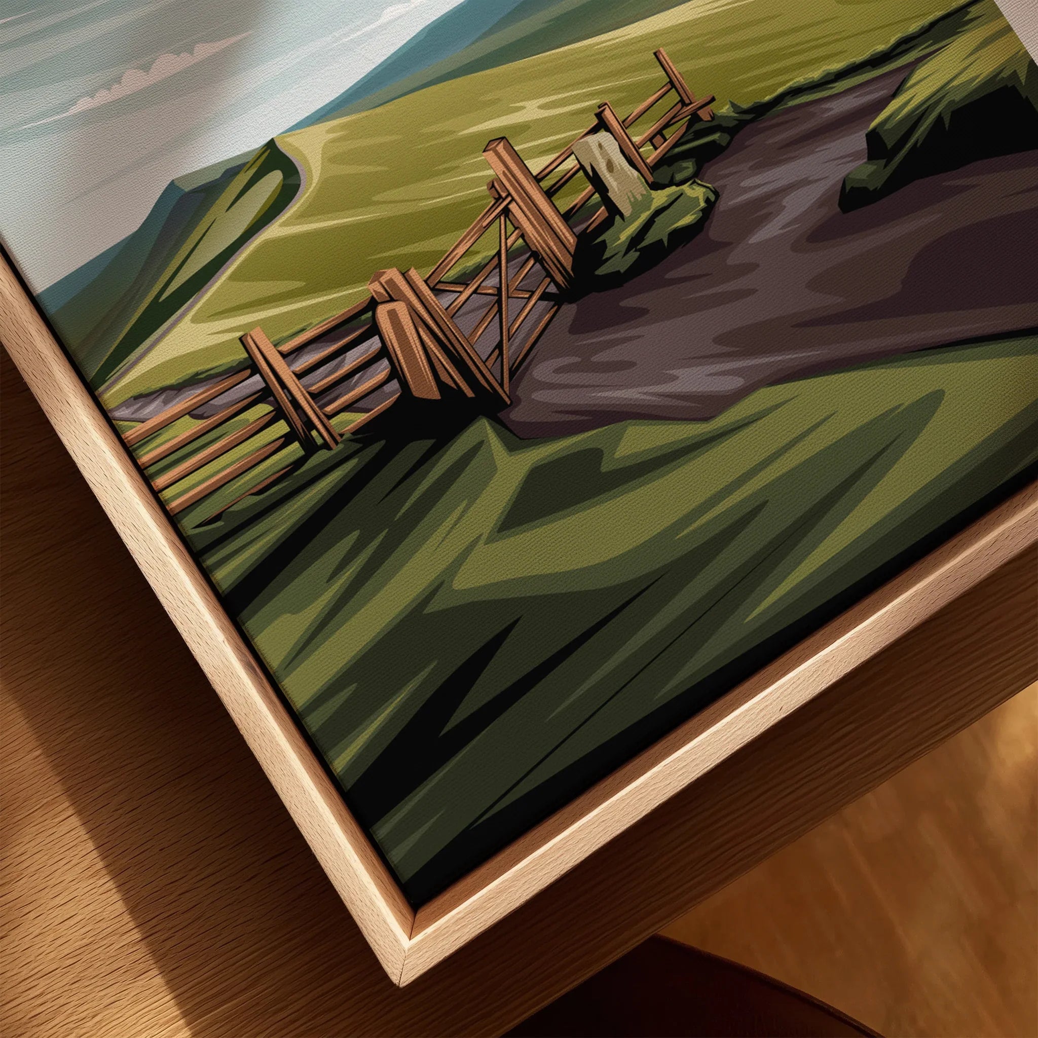 Close-up of framed Peak District landscape canvas print with natural wood floating frame